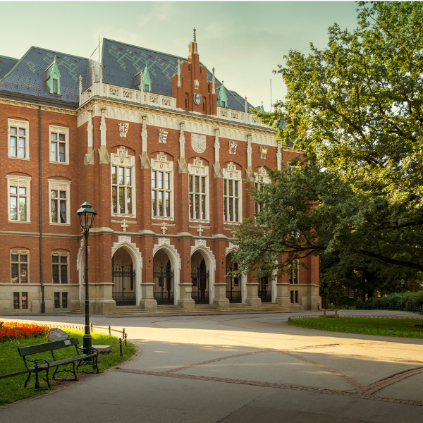 Picture of a university and college with well-maintained trees.